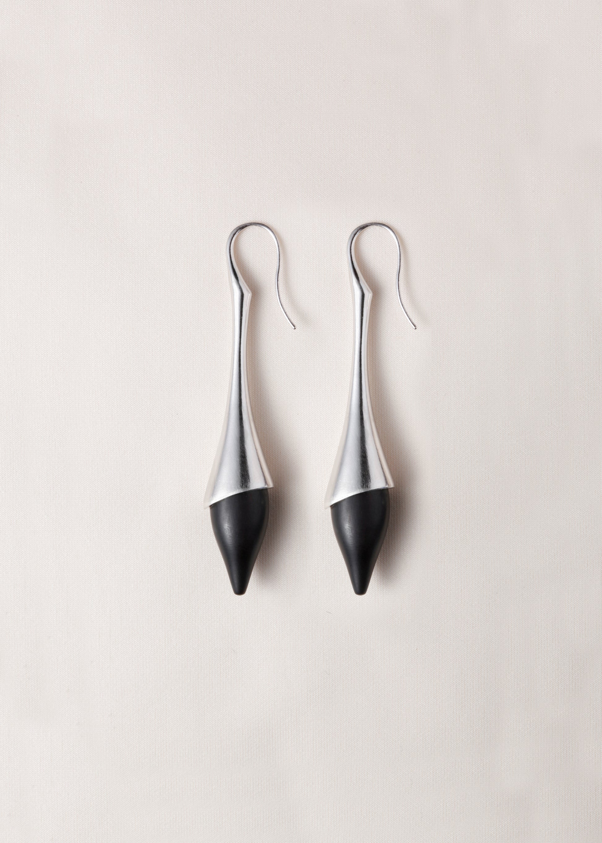 Black buffalo horn Dusk Drop earrings by RIVERLAKE, featuring an elegant drop design and smooth finish.