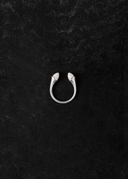 RIVERLAKE teeth ring made of ox bone, featuring a unique white design with intricate details and a smooth finish.