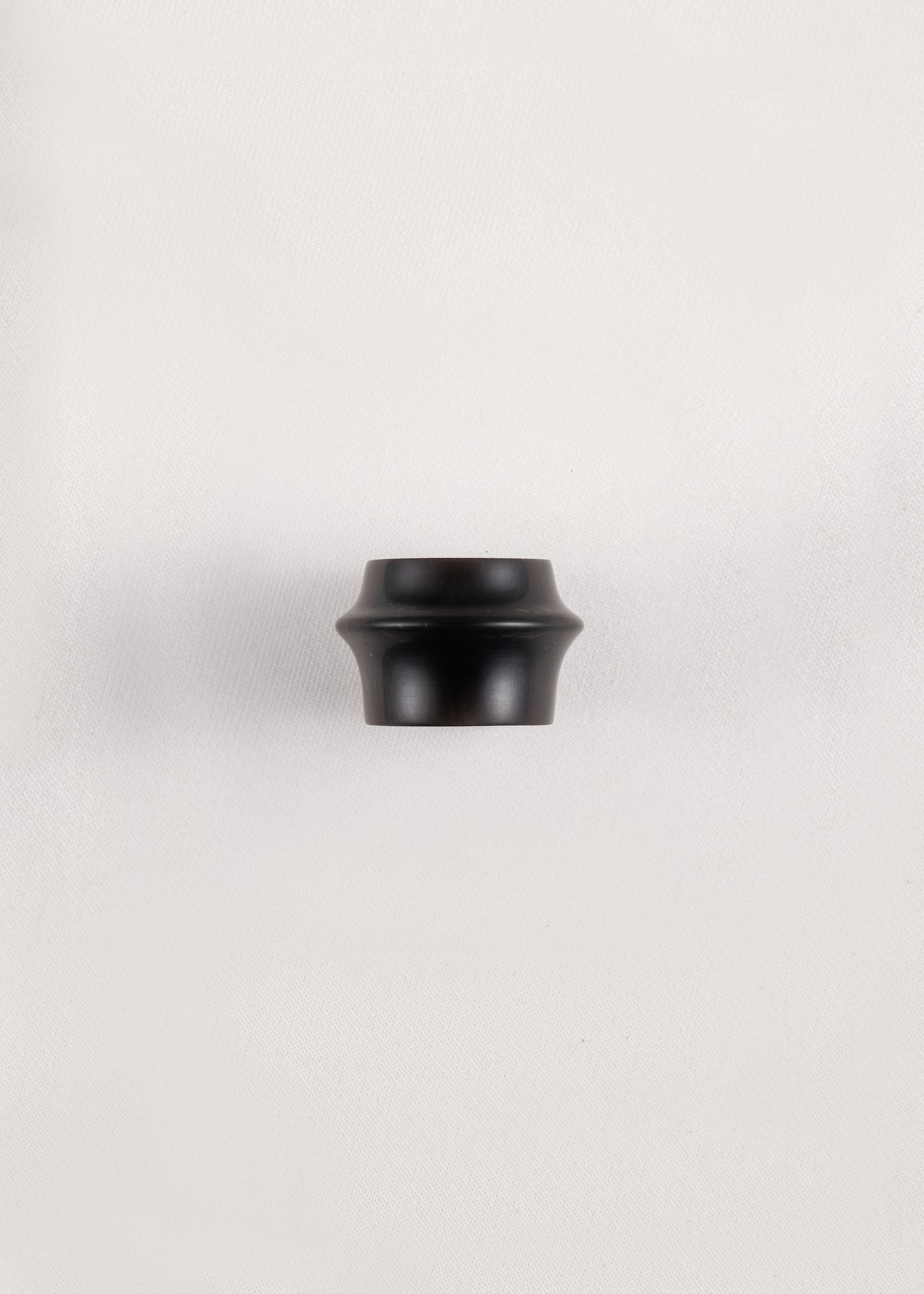 Simple Ridge Ring by RIVERLAKE made from black buffalo horn, featuring a smooth, minimalist design.