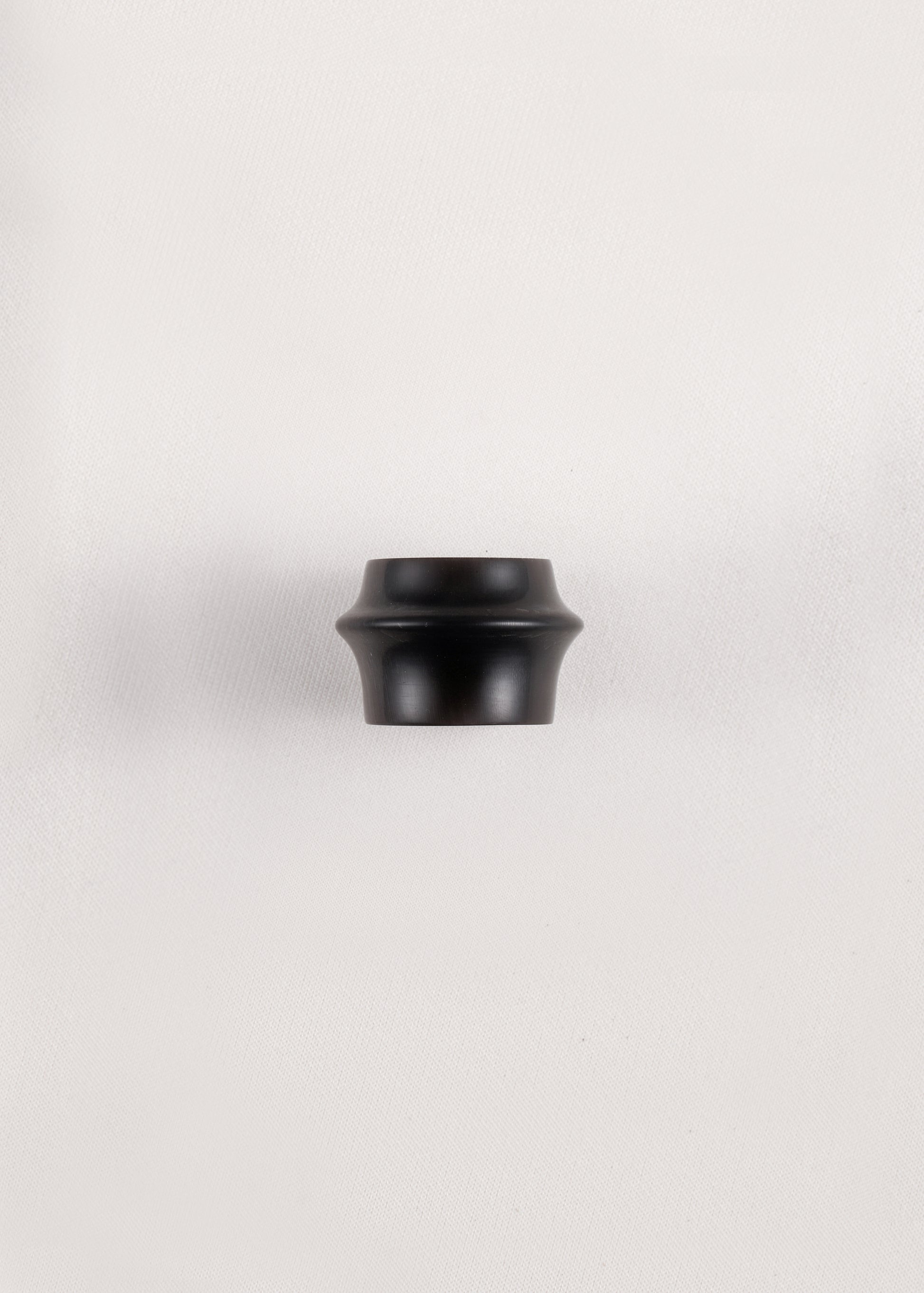 Simple Ridge Ring by RIVERLAKE made from black buffalo horn, featuring a smooth, minimalist design.