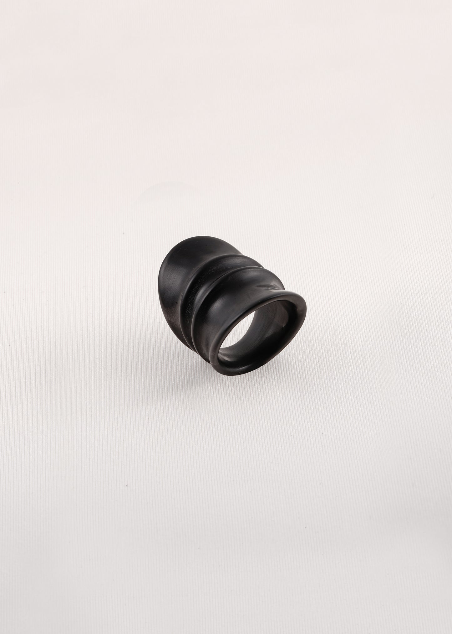 Black Buffalo Horn Hornridge Ring by RIVERLAKE, featuring a smooth, polished finish and unique shape.
