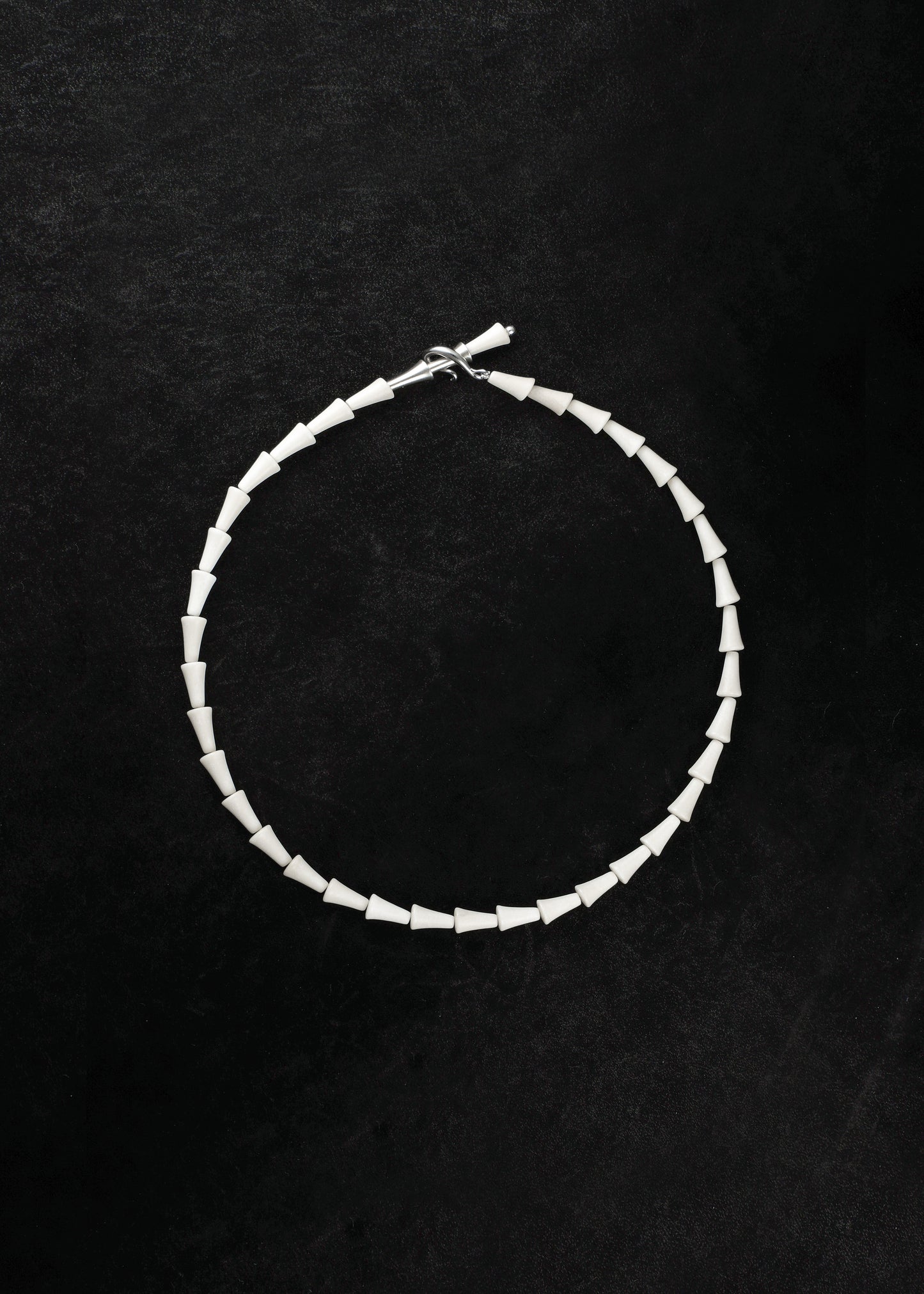 Simple cone necklace in antler color by RIVERLAKE, featuring a sleek, minimalist design on a delicate chain.