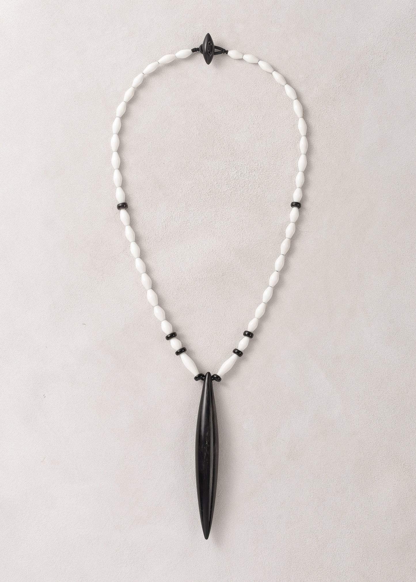 RIVERLAKE Seeker Necklace featuring antler and black buffalo horn in a stylish design.
