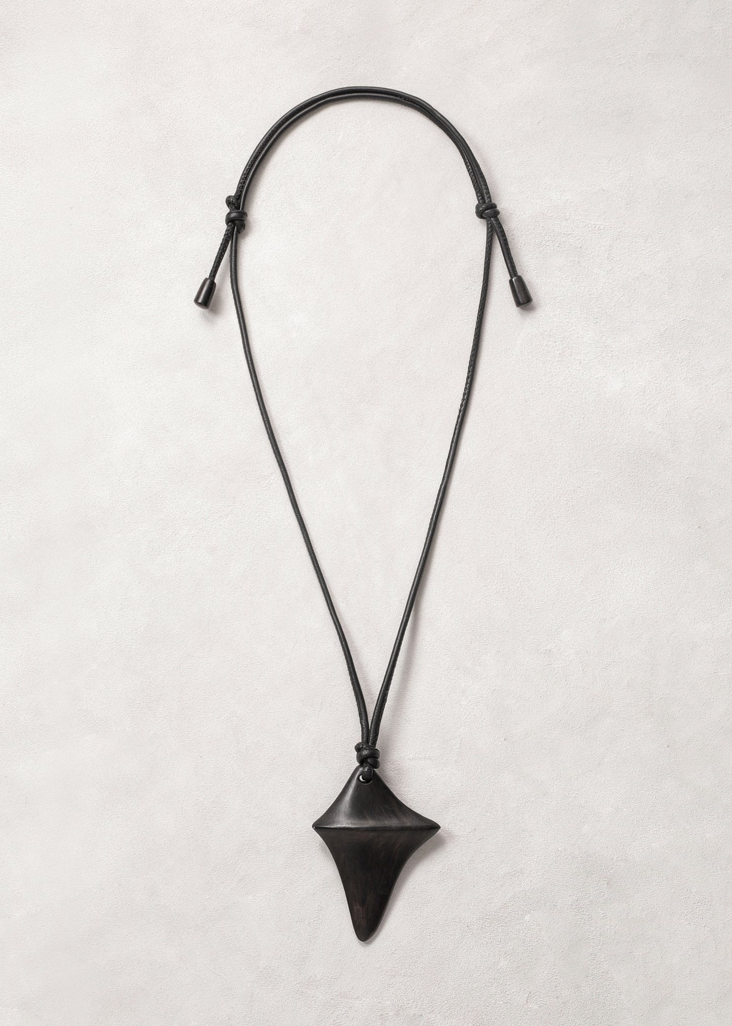 RIVERLAKE Edge Pendant in Ebony showcasing a sleek, modern design with a distinctive finish and elegant silhouette.