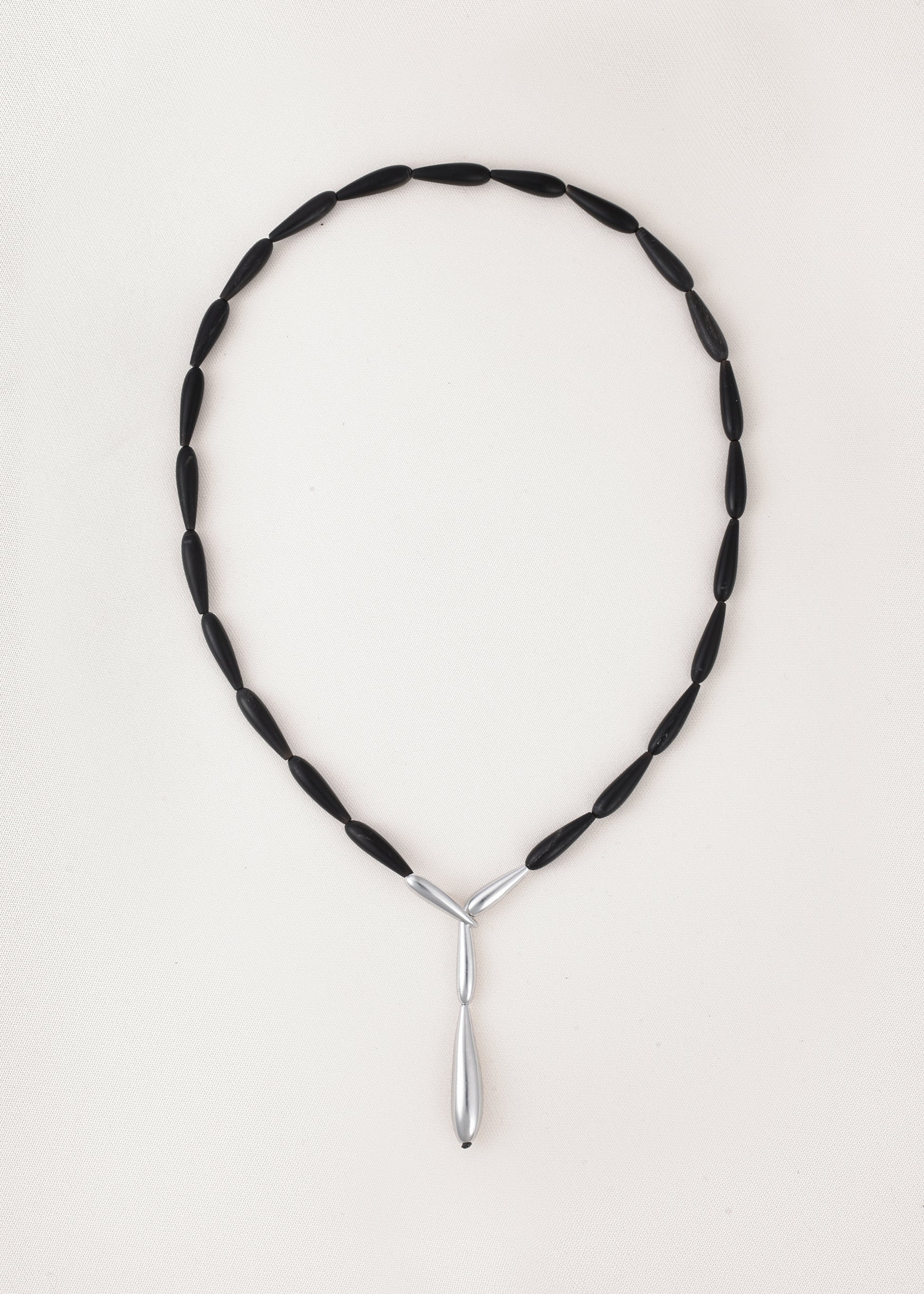 Black buffalo horn Spring necklace by RIVERLAKE, featuring a unique, organic design and elegant finish.