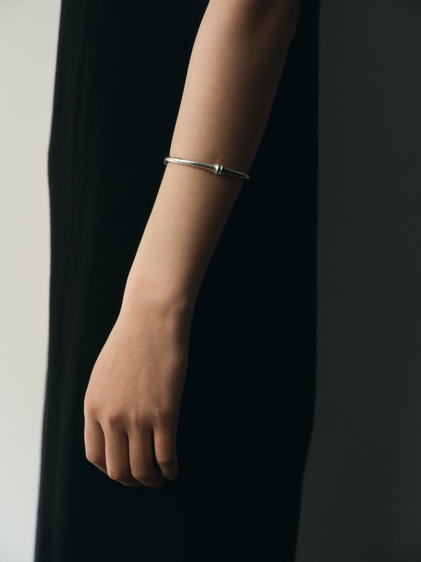 RIVERLAKE Talon Cuff made of black buffalo horn, showcasing a sleek and unique design for a stylish accessory.