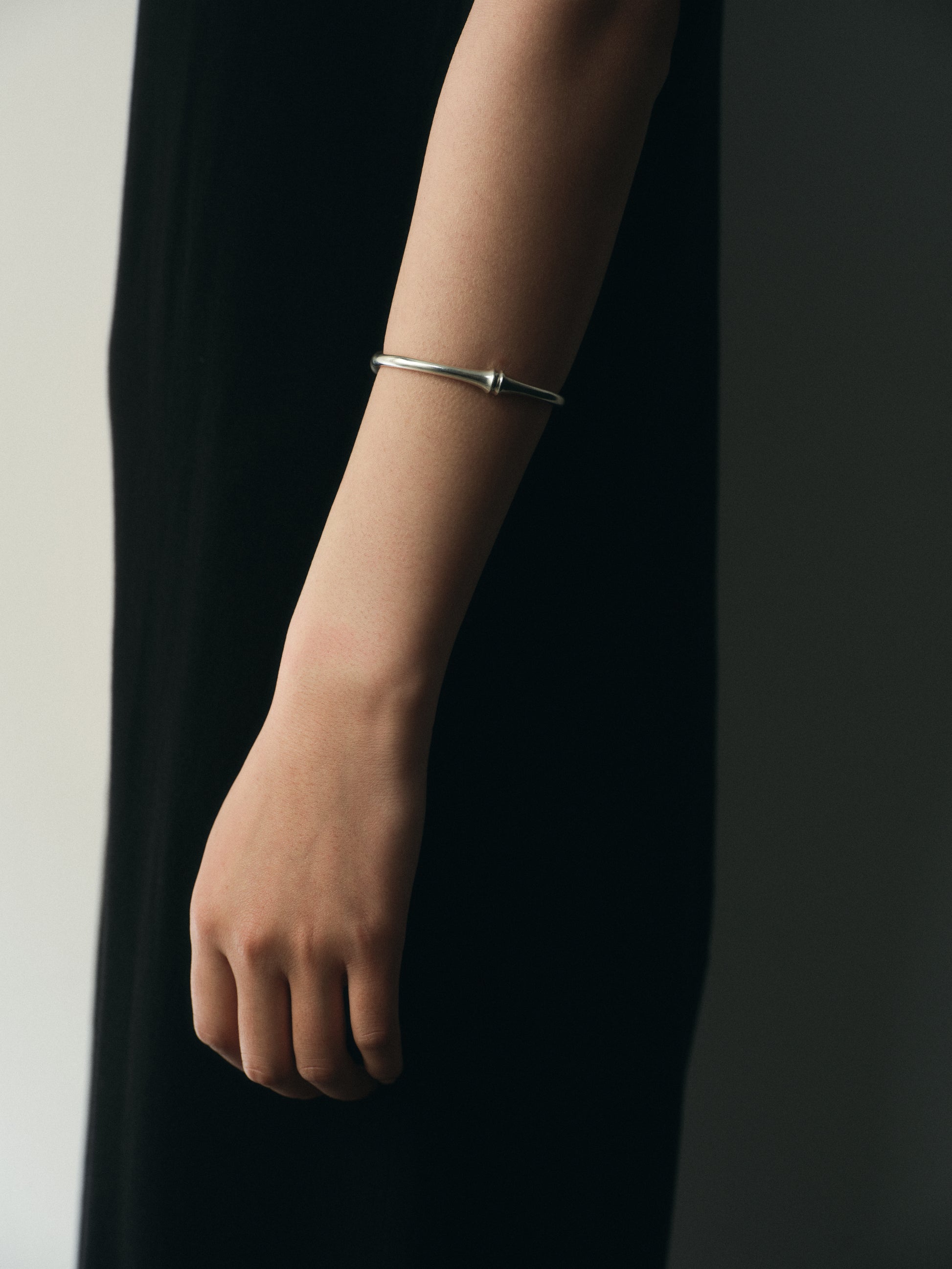 RIVERLAKE Talon Cuff made of black buffalo horn, showcasing a sleek and unique design for a stylish accessory.