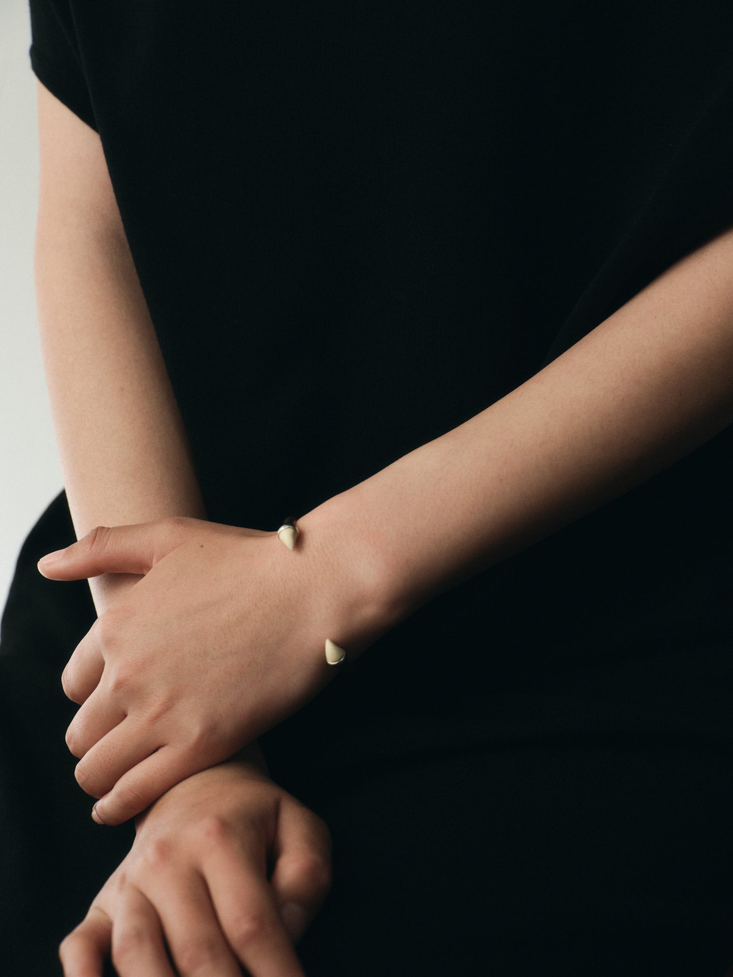 Black buffalo horn Talon cuff bracelet by RIVERLAKE showcasing its sleek, modern design and unique texture.