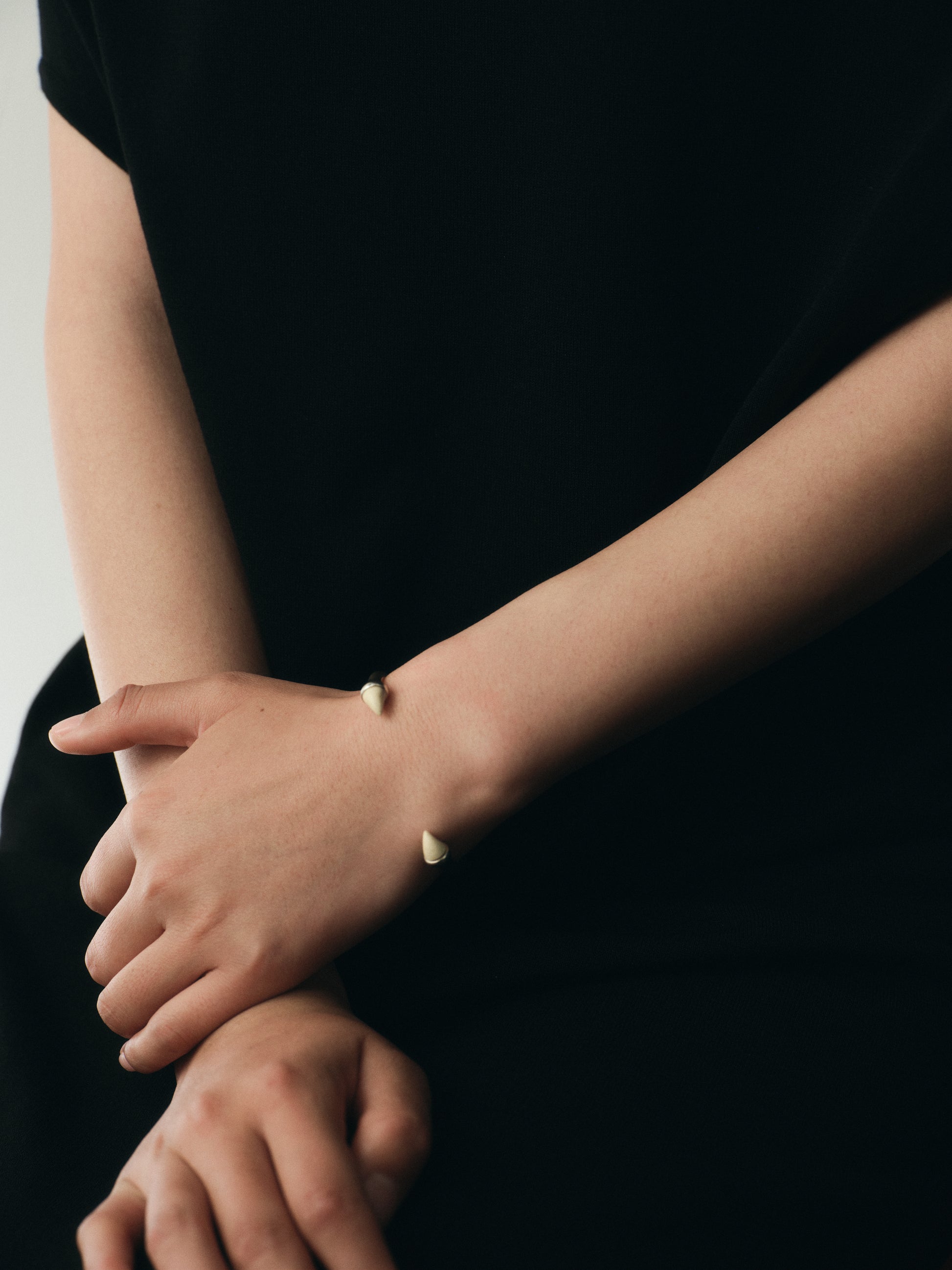 Black buffalo horn Talon cuff bracelet by RIVERLAKE showcasing its sleek, modern design and unique texture.