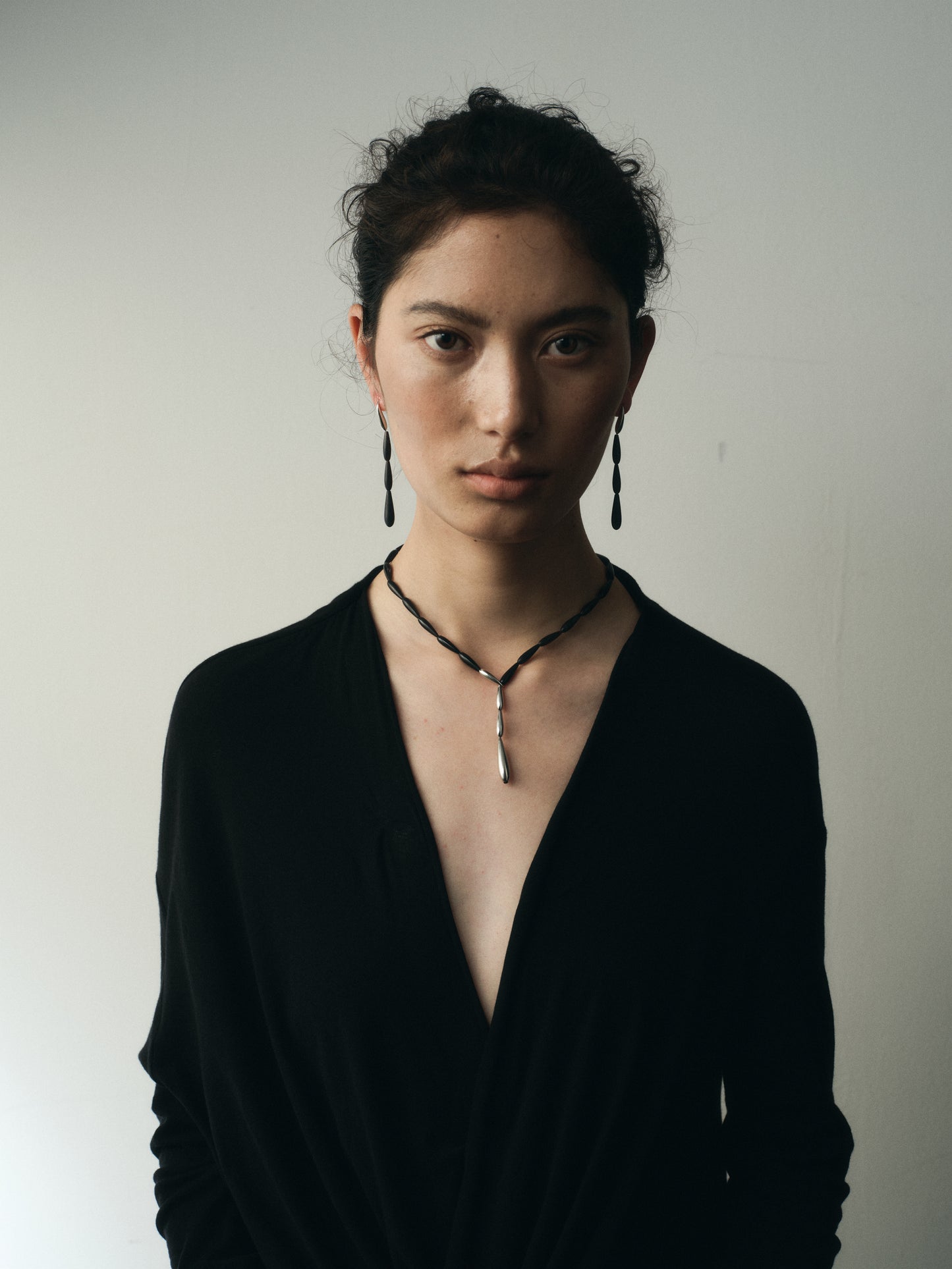 Black buffalo horn spring necklace by RIVERLAKE, featuring a unique, textured design perfect for layering.