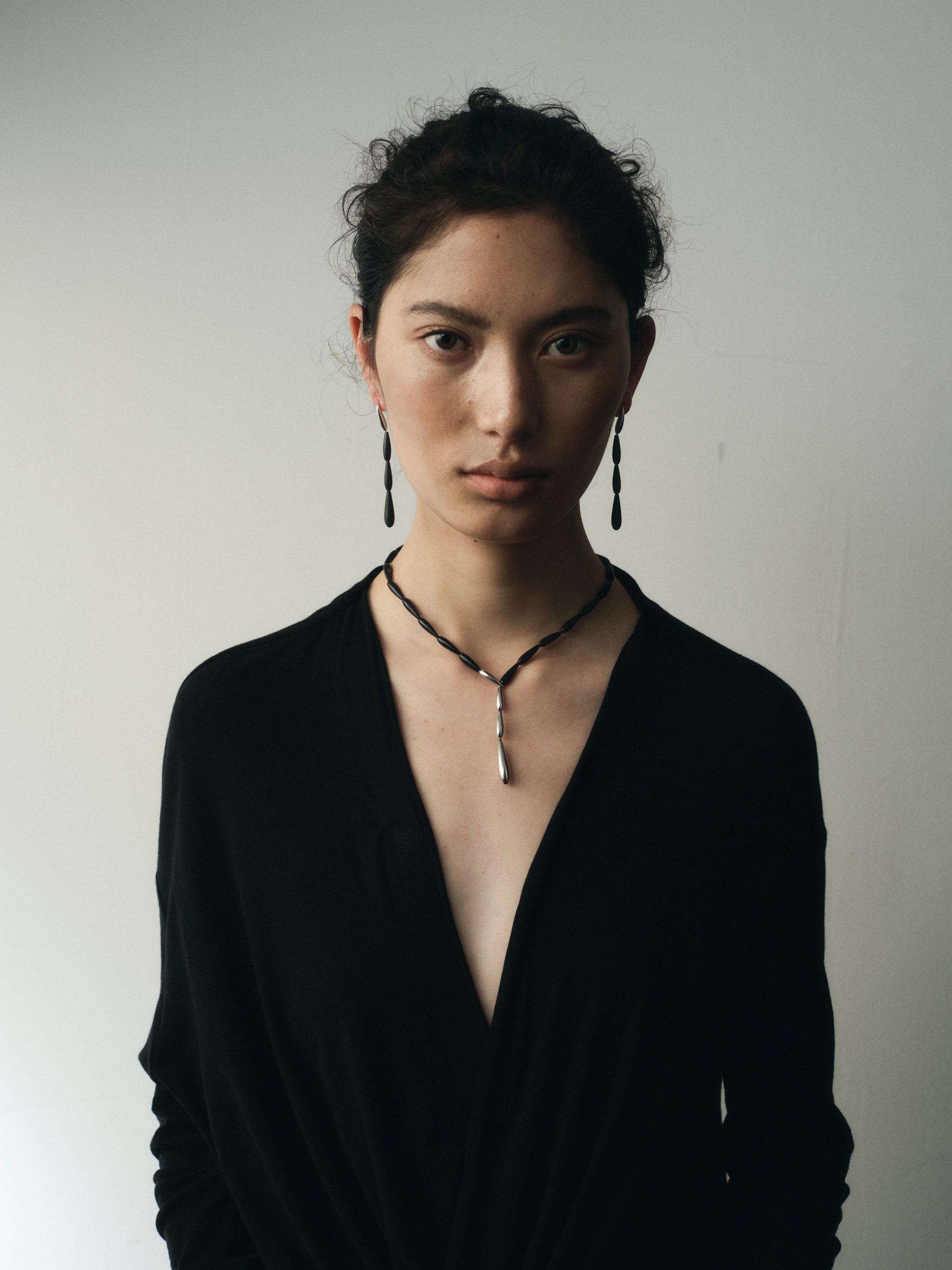 Black buffalo horn spring necklace by RIVERLAKE, featuring a unique, textured design perfect for layering.