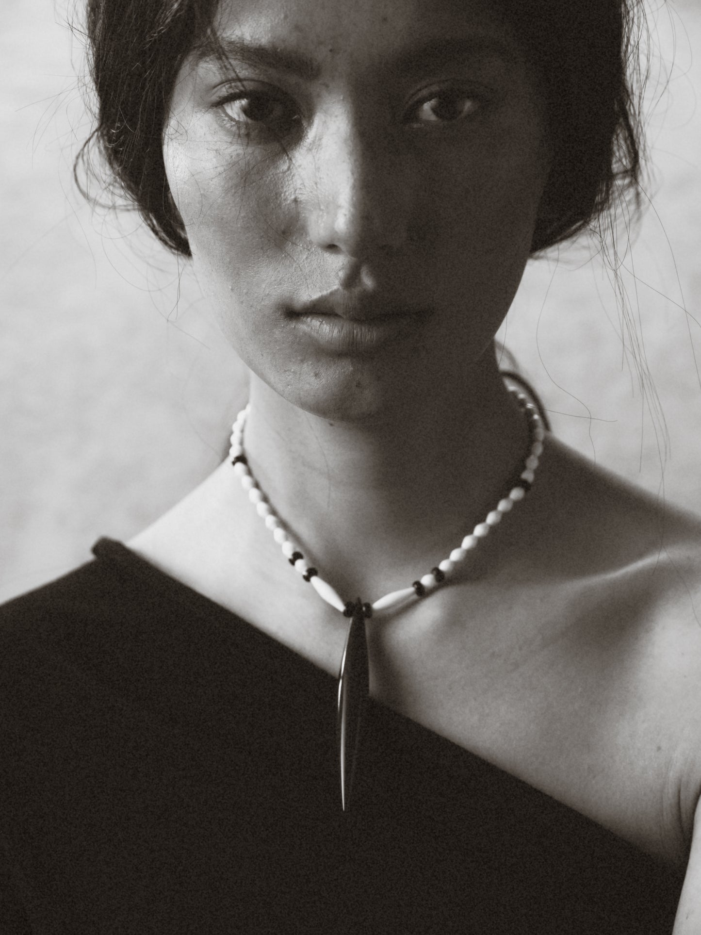 Seeker Necklace by RIVERLAKE featuring antler and black buffalo horn in an elegant design.