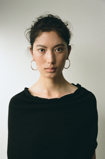 Large yellow buffalo horn hoops by RIVERLAKE, featuring a sleek, lightweight design for everyday wear.