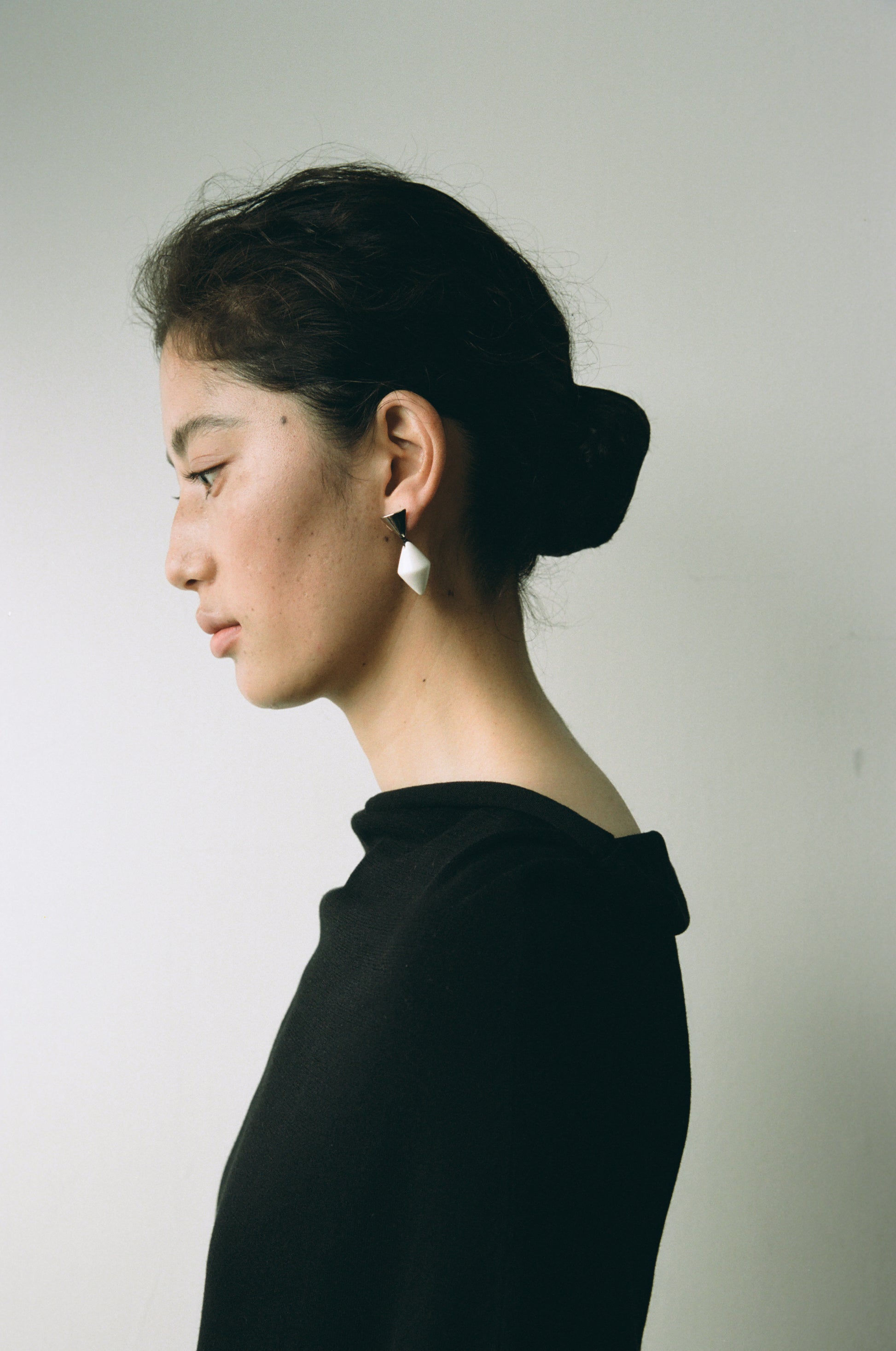 Black buffalo horn cone drop earrings by RIVERLAKE, showcasing a sleek, modern design with a polished finish.