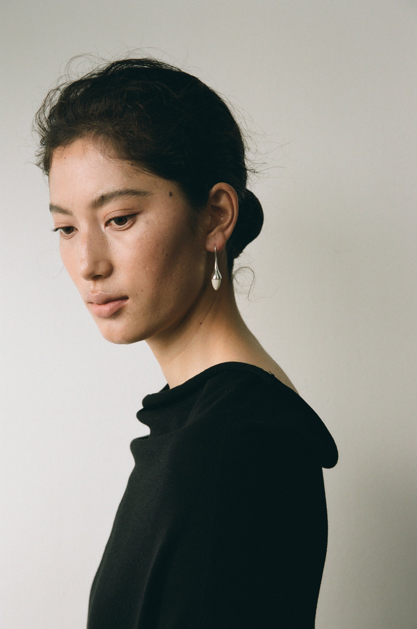 Black buffalo horn dewdrop earrings by RIVERLAKE, showcasing a sleek and elegant design.