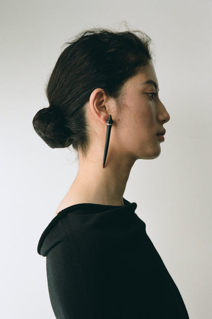 Black buffalo horn long tooth earrings by RIVERLAKE, showcasing a sleek and elegant design.