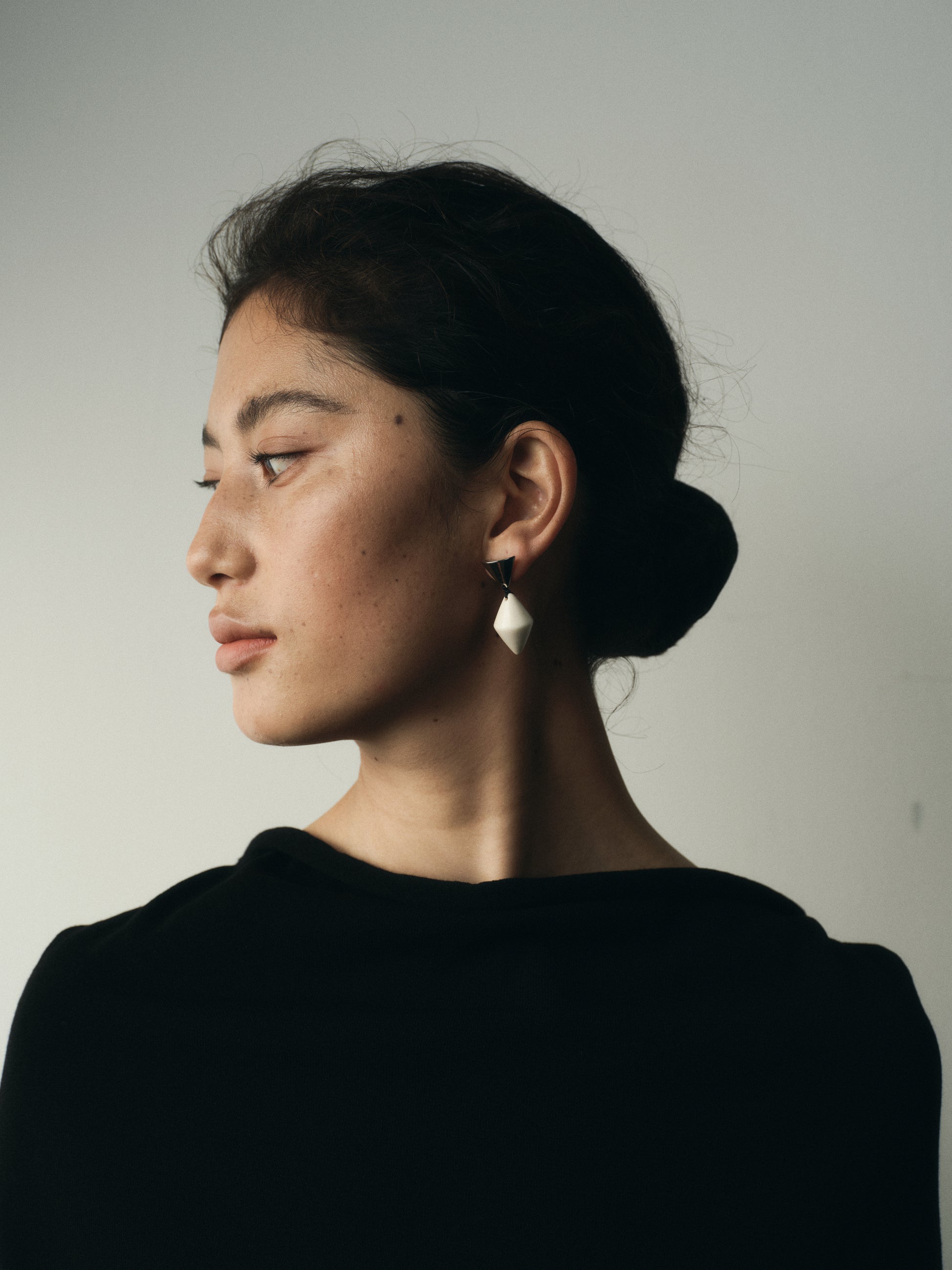 Black buffalo horn cone drop earrings by RIVERLAKE featuring a sleek, modern design and elegant dangling style.