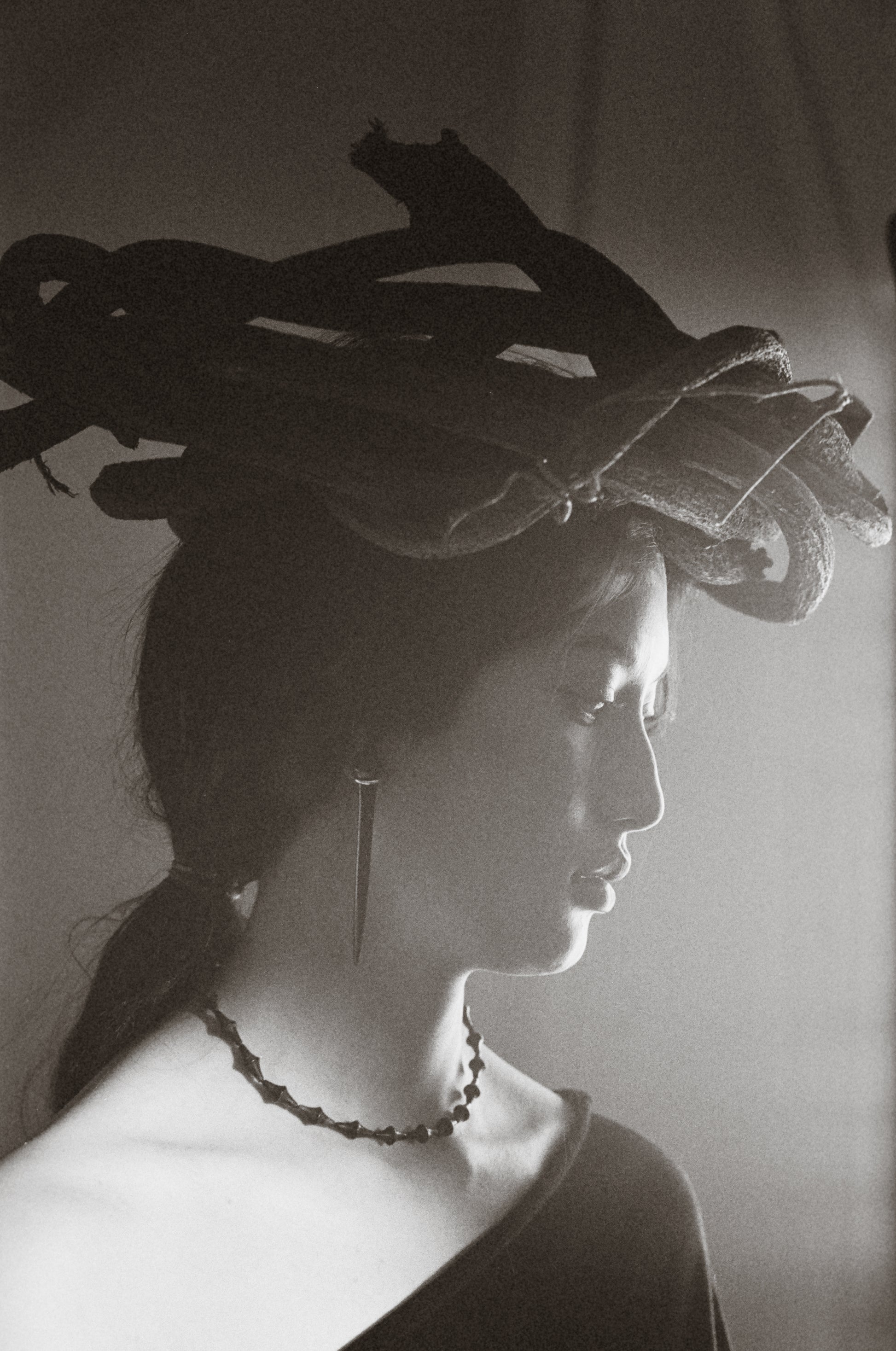 RIVERLAKE Nyx necklace featuring a sleek black buffalo horn pendant on a delicate chain.