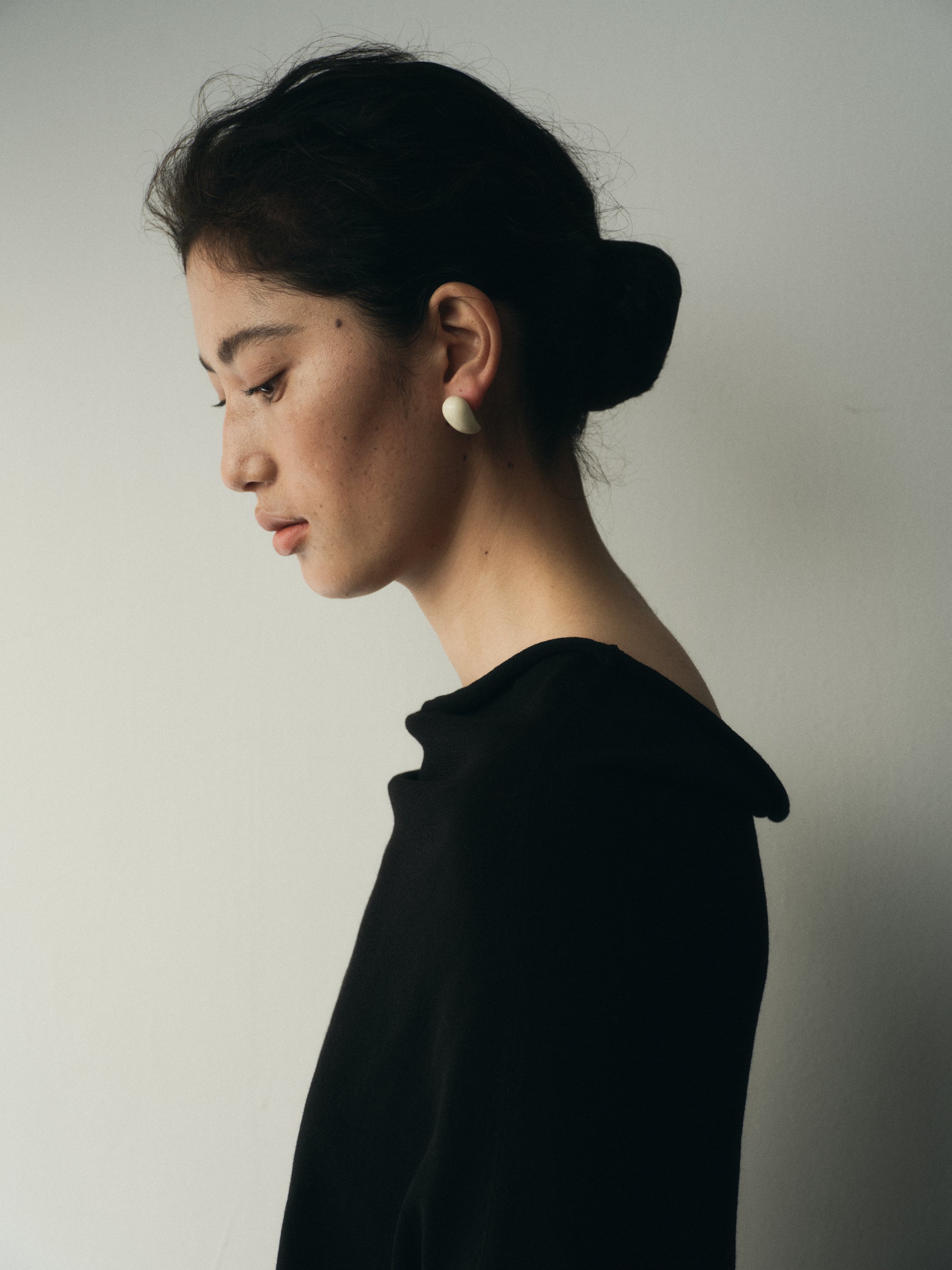 Black buffalo horn small fang earrings by RIVERLAKE with a sleek, modern design and unique texture.