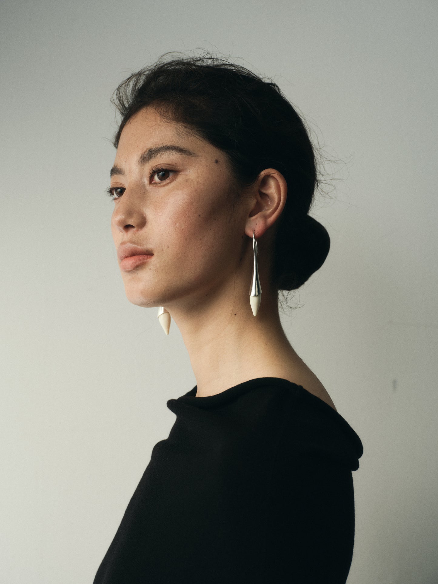 Dusk Drop Earrings by RIVERLAKE featuring elegant black buffalo horn design and unique drop silhouette.