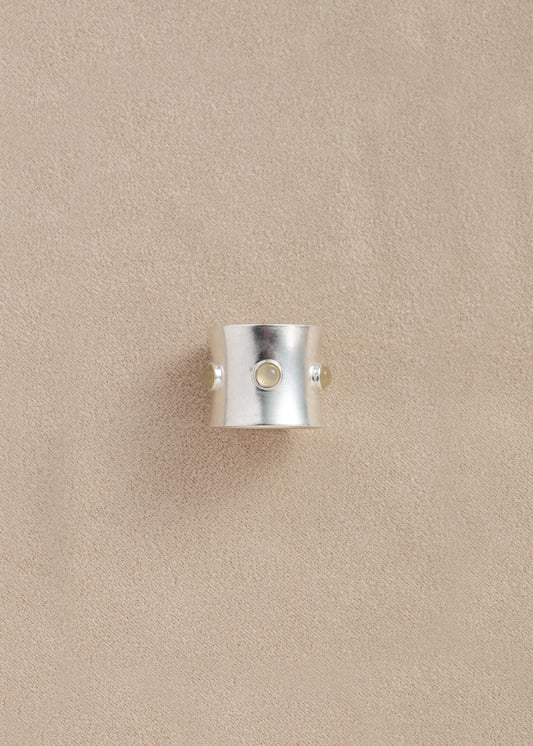 RIVERLAKE Pupil Ring crafted from yellow buffalo horn, showcasing a smooth, polished finish and unique texture.