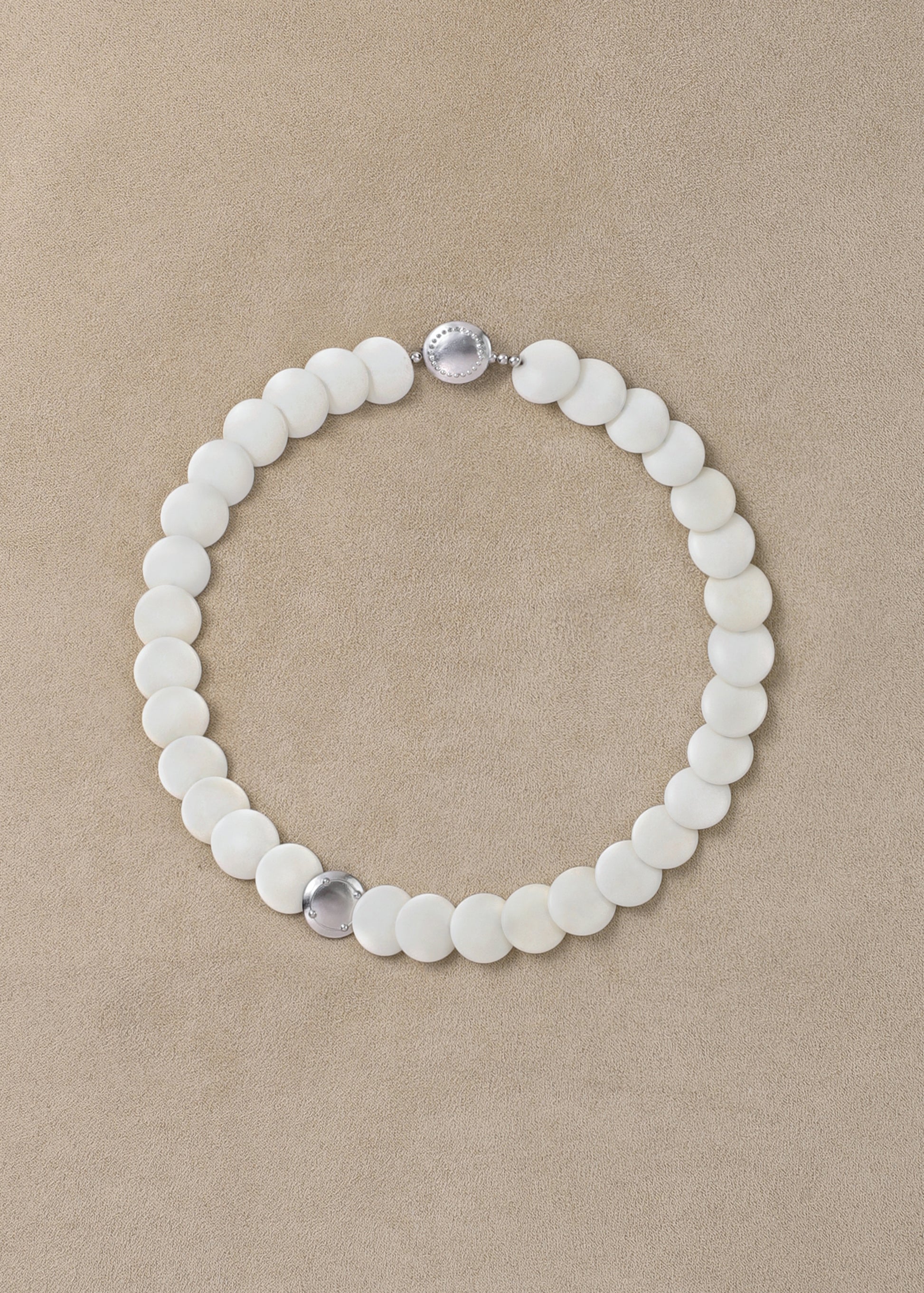 Coco Necklace by RIVERLAKE featuring an antler pendant on a delicate chain, showcasing a natural and elegant design.