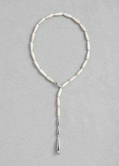 Black buffalo horn spring necklace by RIVERLAKE, featuring a unique, curved design perfect for layering or standalone wear.