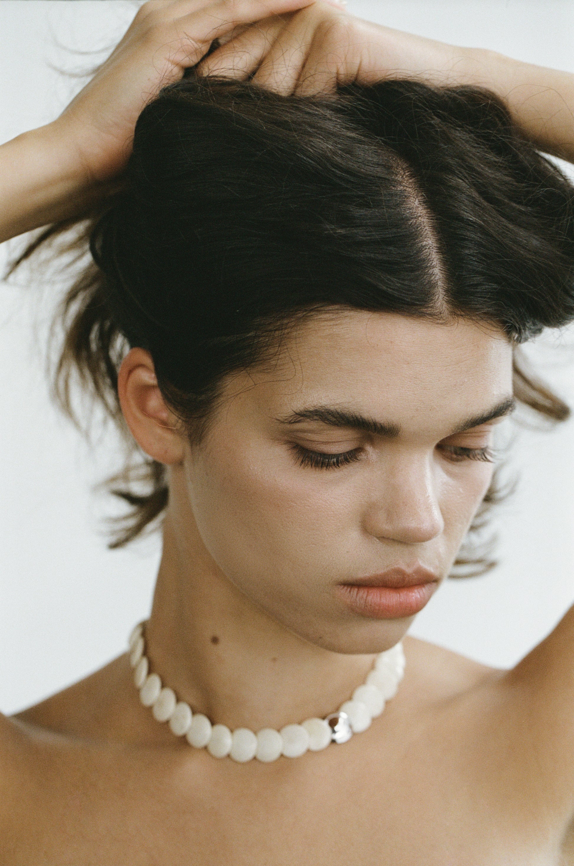 Coco Necklace in Antler by RIVERLAKE featuring a unique pendant and delicate chain design.