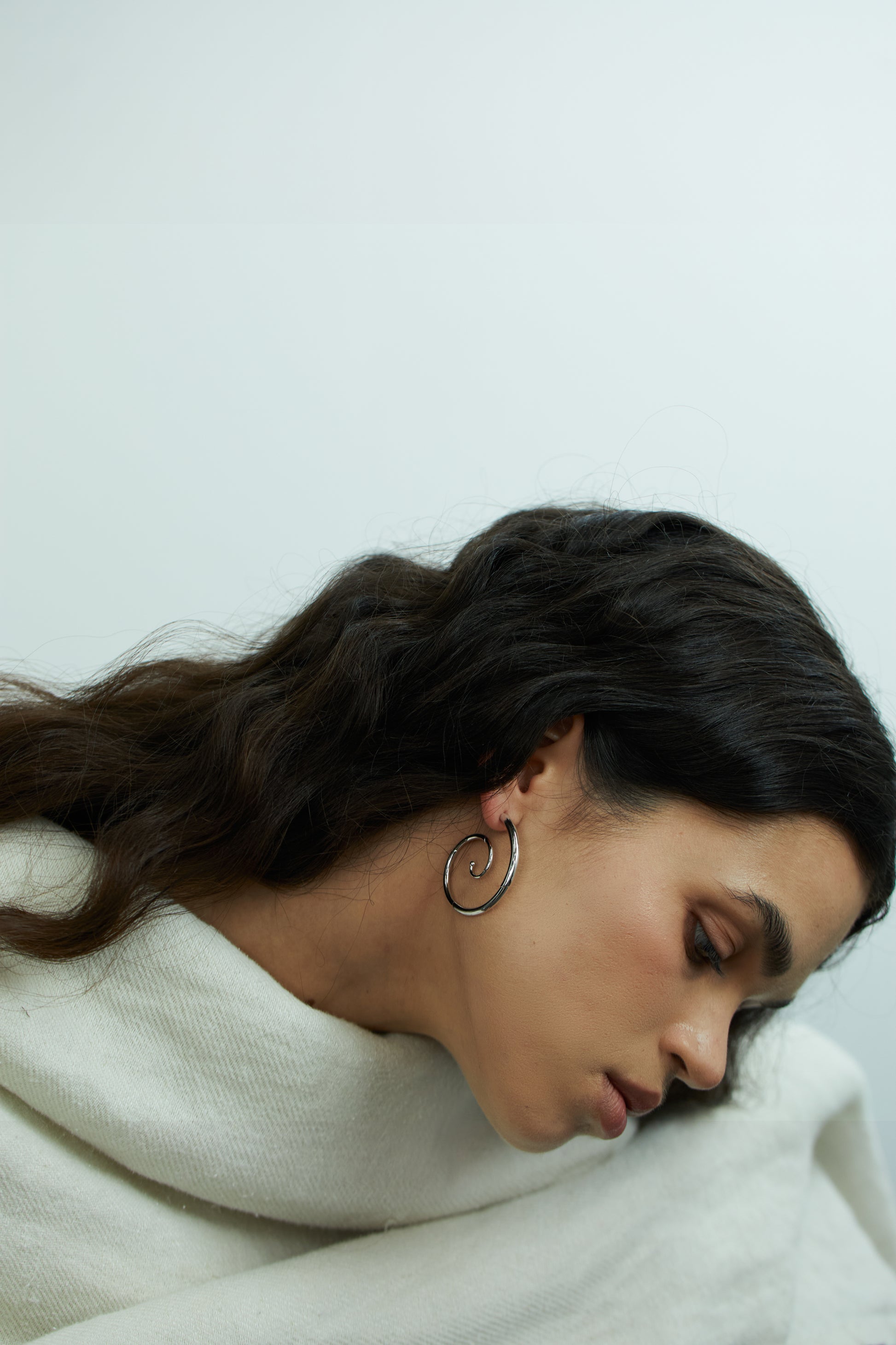 Elegant RIVERLAKE Tendril Earrings with a flowing design featuring delicate curves and a polished finish.